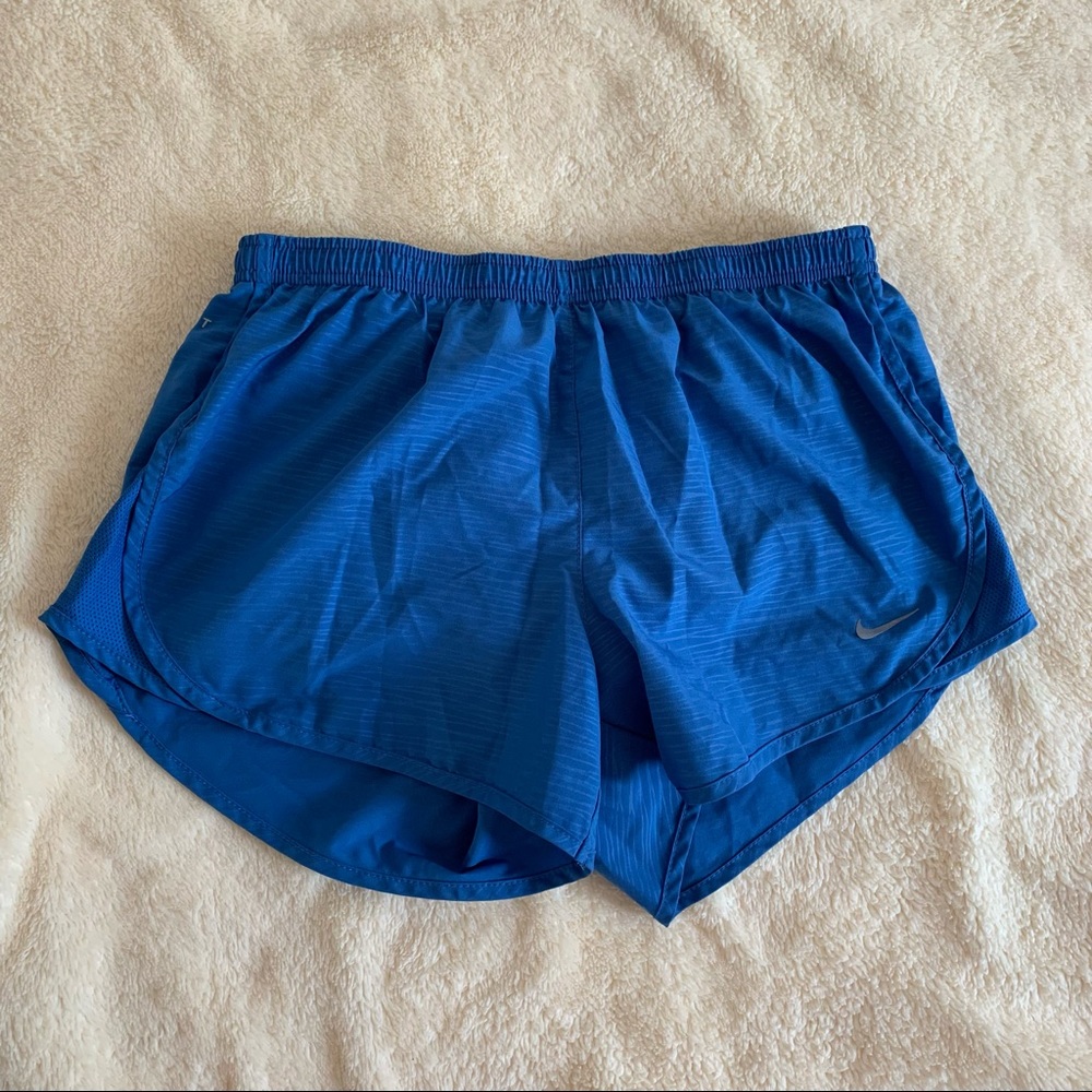 Blue Nike dri fit athletic shorts